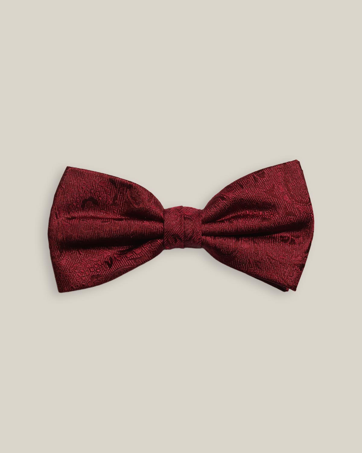 Burgundy silk bow tie with a tonal woven paisley pattern, front view