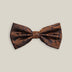 Rust silk bow tie with a dark contrasting woven paisley pattern, front view
