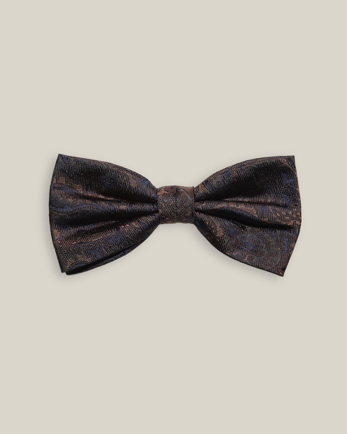 Dark brown silk bow tie with a subtle woven paisley pattern, front view