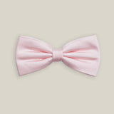 Soft pink pre-tied bow tie with a finely textured woven silk finish