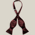 Untied burgundy silk satin bow tie with classic butterfly-shaped ends