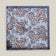 Light-blue printed silk pocket square with large brown, ivory and deep blue paisley motifs and a contrasting navy border.