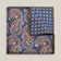 Navy double-face silk pocket square with ornate brown, orange and ivory paisley, a small floral medallion reverse and a brown border.