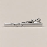 Stockholm Kravatt silver-tone tie clip with two textured diagonal details and a spring-loaded fastening