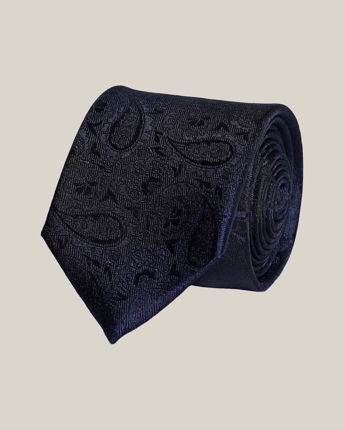 Navy paisley 100% silk tie by Stockholm Kravatt, rolled detail view