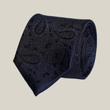 Navy paisley 100% silk tie by Stockholm Kravatt, rolled detail view