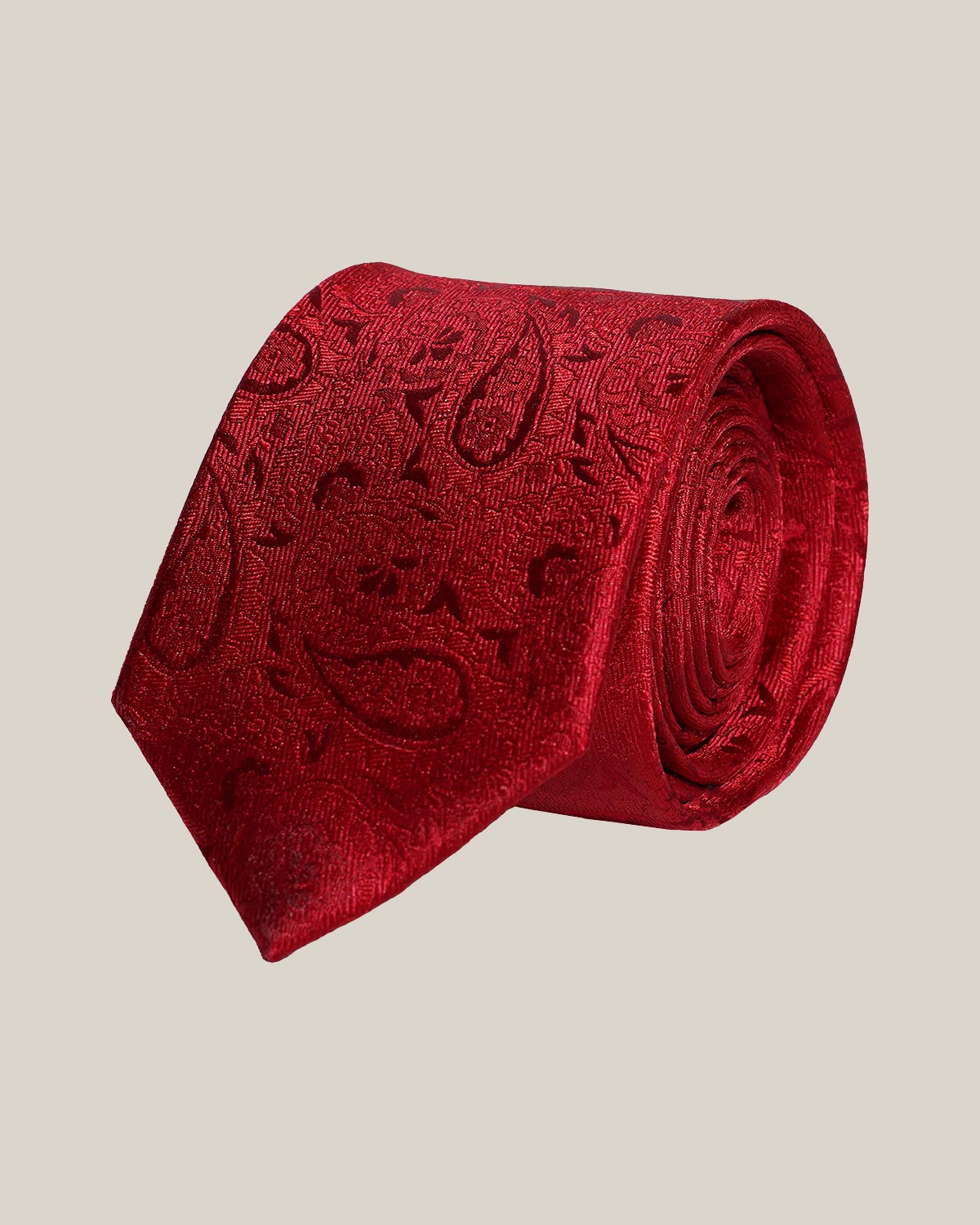 Red paisley 100% silk tie by Stockholm Kravatt, flat lay