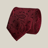 Burgundy paisley 100% silk tie by Stockholm Kravatt, rolled detail view