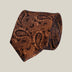 Bronze paisley 100% silk tie by Stockholm Kravatt, rolled detail view
