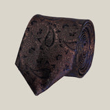 Dark brown paisley 100% silk tie by Stockholm Kravatt, rolled detail view