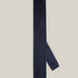 Navy knitted tie with a textured surface and classic straight square end