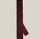 Burgundy knitted tie with a textured surface and classic straight square end