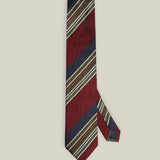 Full view of burgundy and navy silk tie with olive green and ivory diagonal stripes
