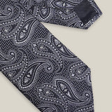 Navy woven silk tie with an intricate all-over silver paisley pattern