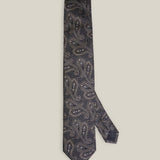 Navy blue woven silk tie with an intricate all-over brown paisley pattern