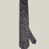 Navy blue woven silk tie with an intricate all-over brown paisley pattern