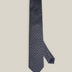 Navy woven silk tie with small light blue floral motifs by Stockholm Kravatt