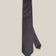 Dark navy woven silk tie with a small silver-toned geometric pattern