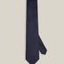 Dark navy woven pure silk tie on a neutral background