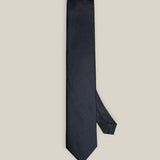 Full view of navy blue Oxford silk tie with subtle woven texture