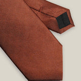 Stockholm Kravatt rust-coloured pure silk tie with a subtle Oxford texture