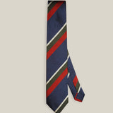 Navy Club Stripe Silk Tie — detail view with Stockholm Kravatt label