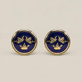 Round gold cufflinks with navy blue enamel face and three crowns motif